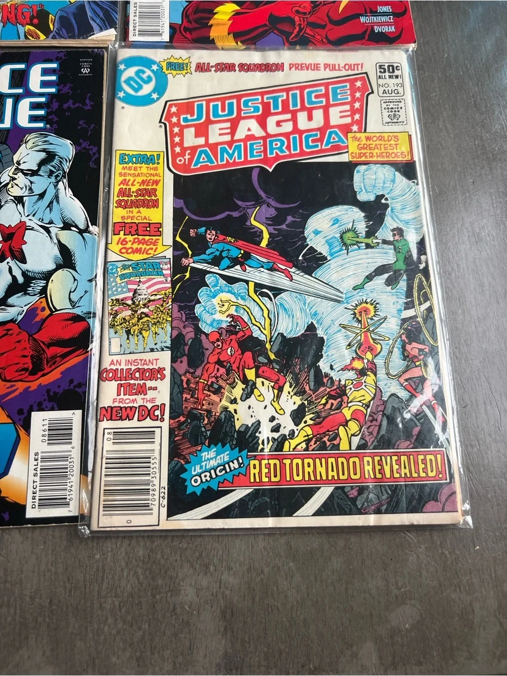 DC Comics Justice League of America Comic Covers - Red, Blue, Black, Yellow
